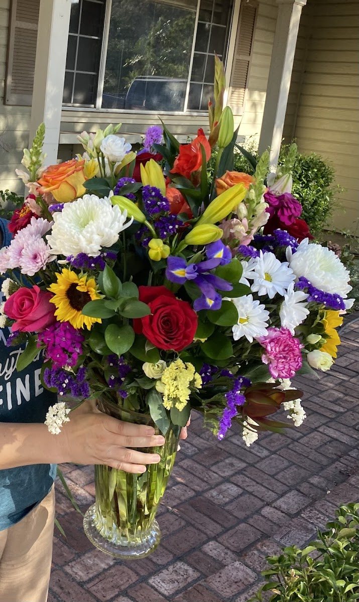 Large mixed bouquet with sunflowers, lilies and roses